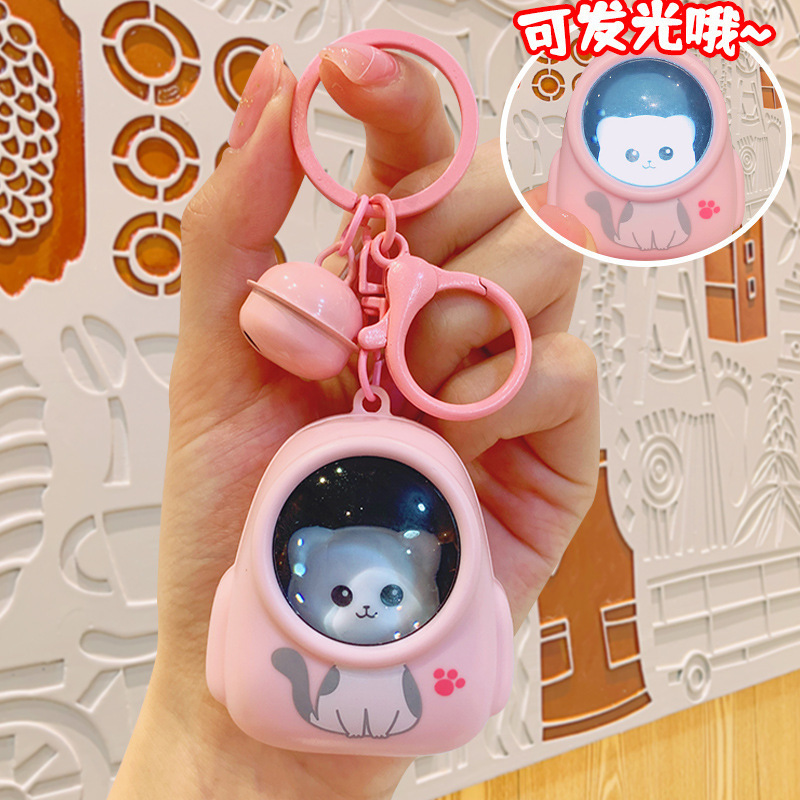 Pink glowing backpack with bell