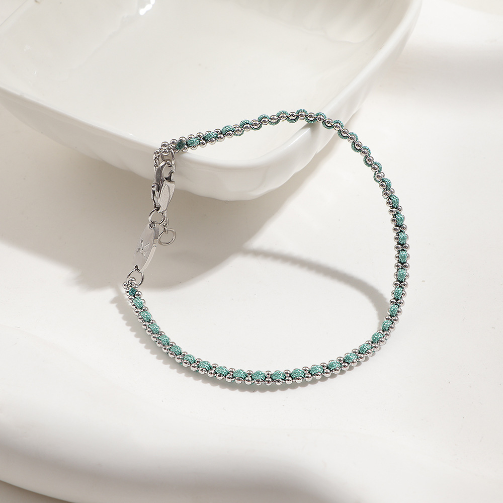 bracelet en corde verte tressée couleur acier