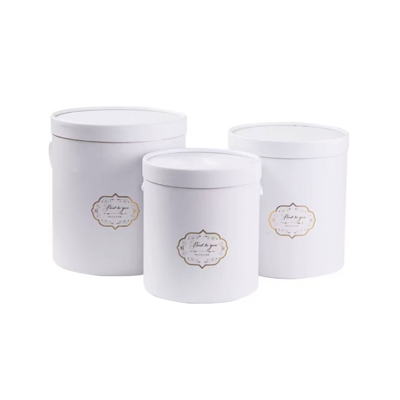 Three white covered covers (one large, one medium and one small)