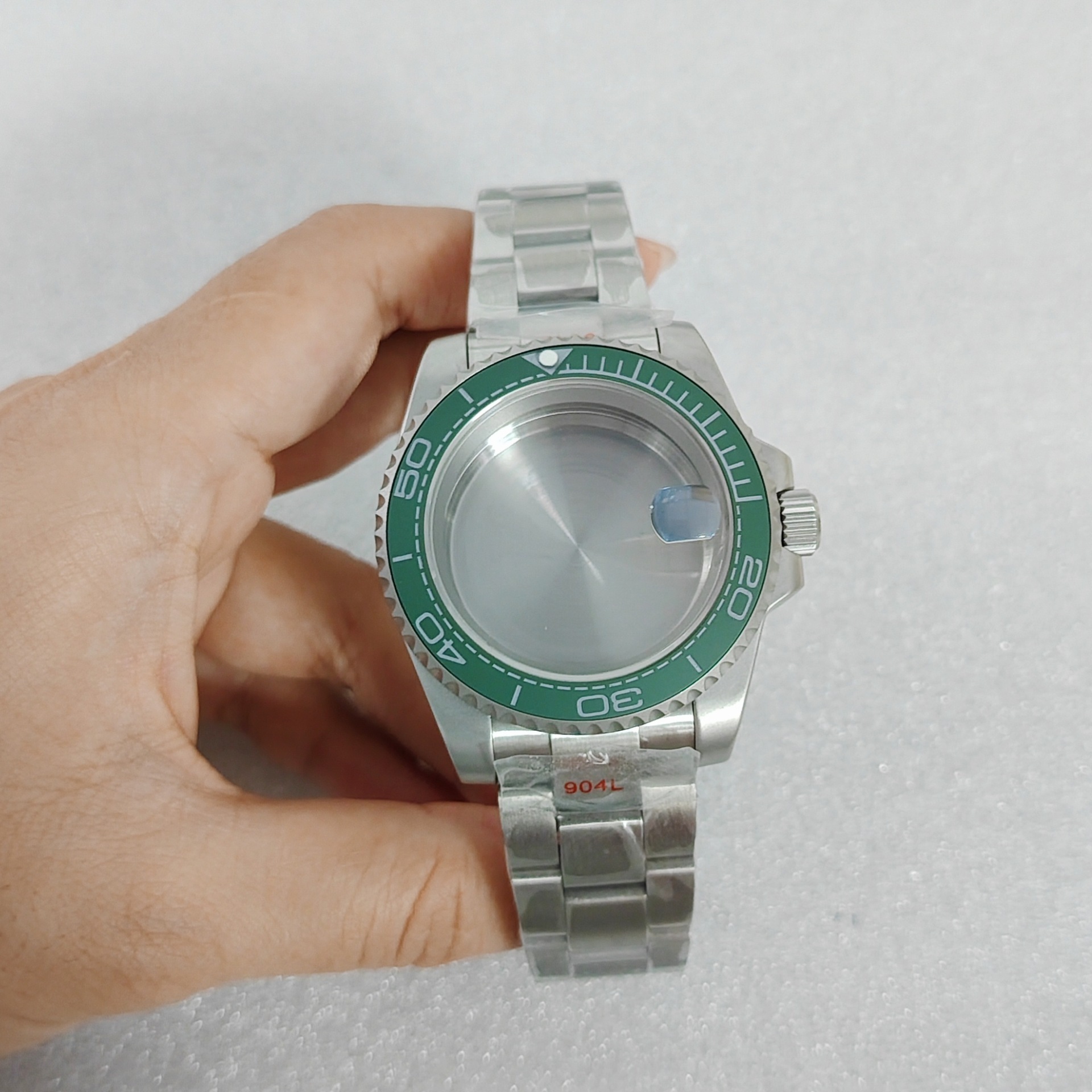 Green circle with white text magnifying glass