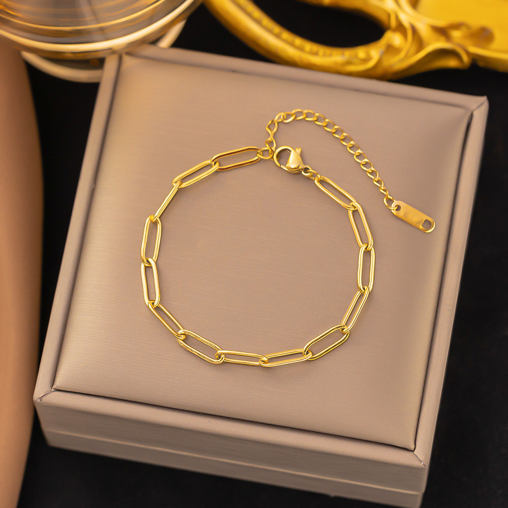 sle94-bracelet chaîne croix or
