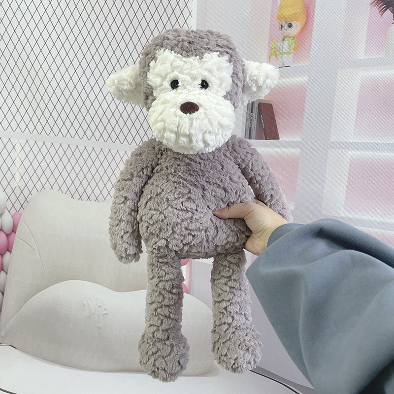 Concha de piel de mono con cara larga y peluda en relieve