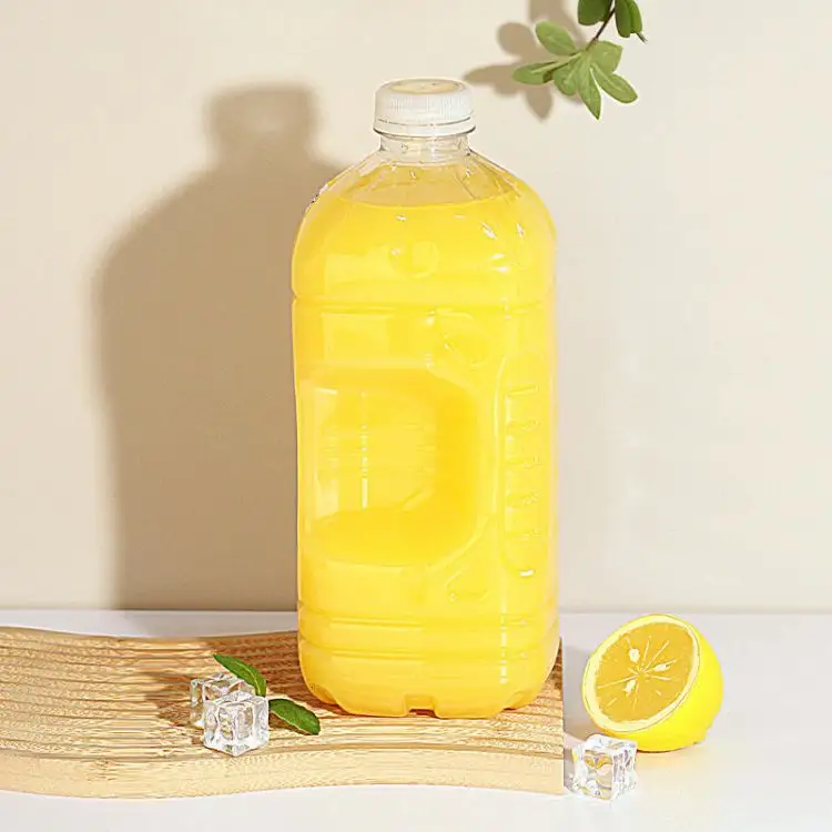 Commercio all'ingrosso Spot chiaro PET 1800ml per uso alimentare succo di frutta bevanda di imballaggio bottiglia di plastica per bevande