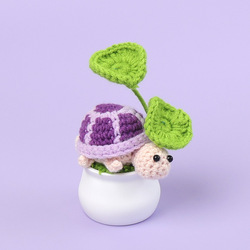 Turtle (cooling under the leaves) potted plant-purple