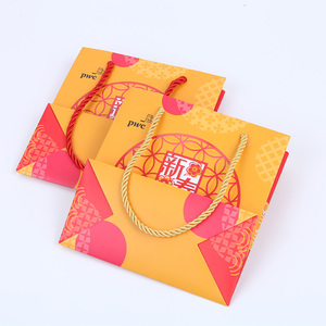 エコフレンドリーお祝い<span class=keywords><strong>CNY</strong></span>オレンジギフトバッグスポットuvスタンピング新年キャリアバッグデザインシンガポール