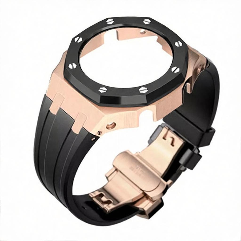 Boîtier en or rose avec lunette noire et bracelet en silicone noir