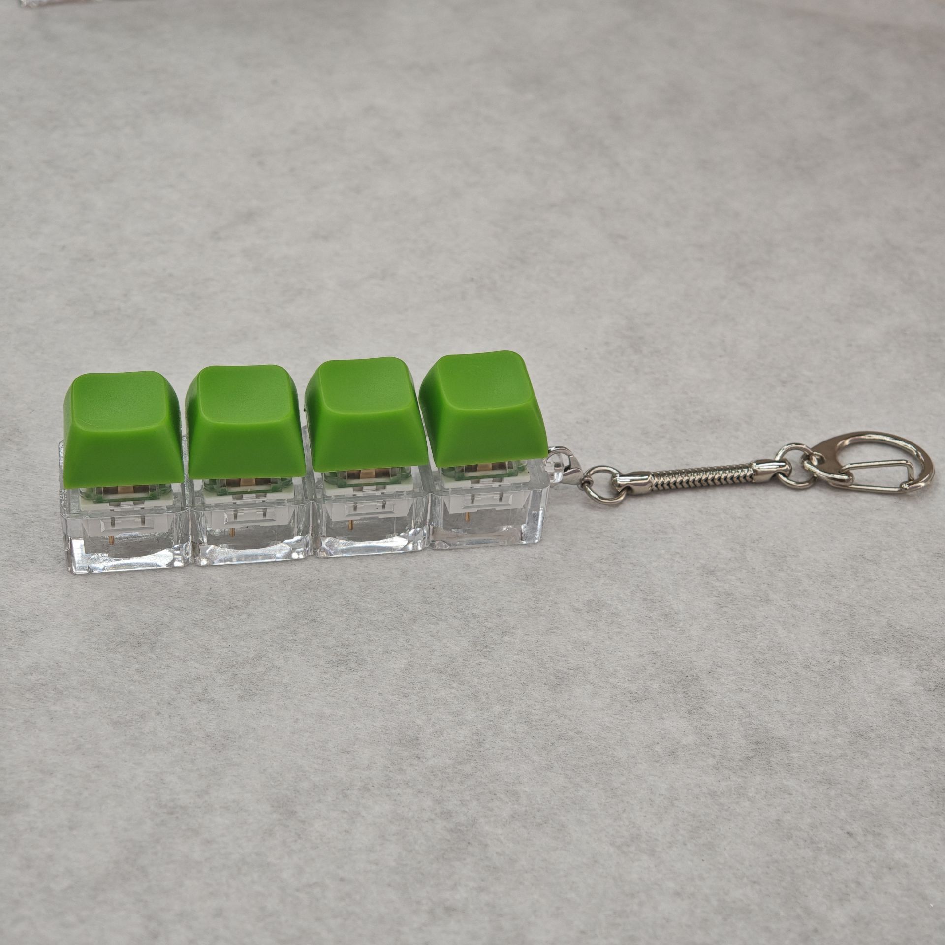 Coque inférieure transparente à quatre touches-vert