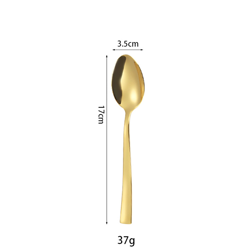gold dessert spoon