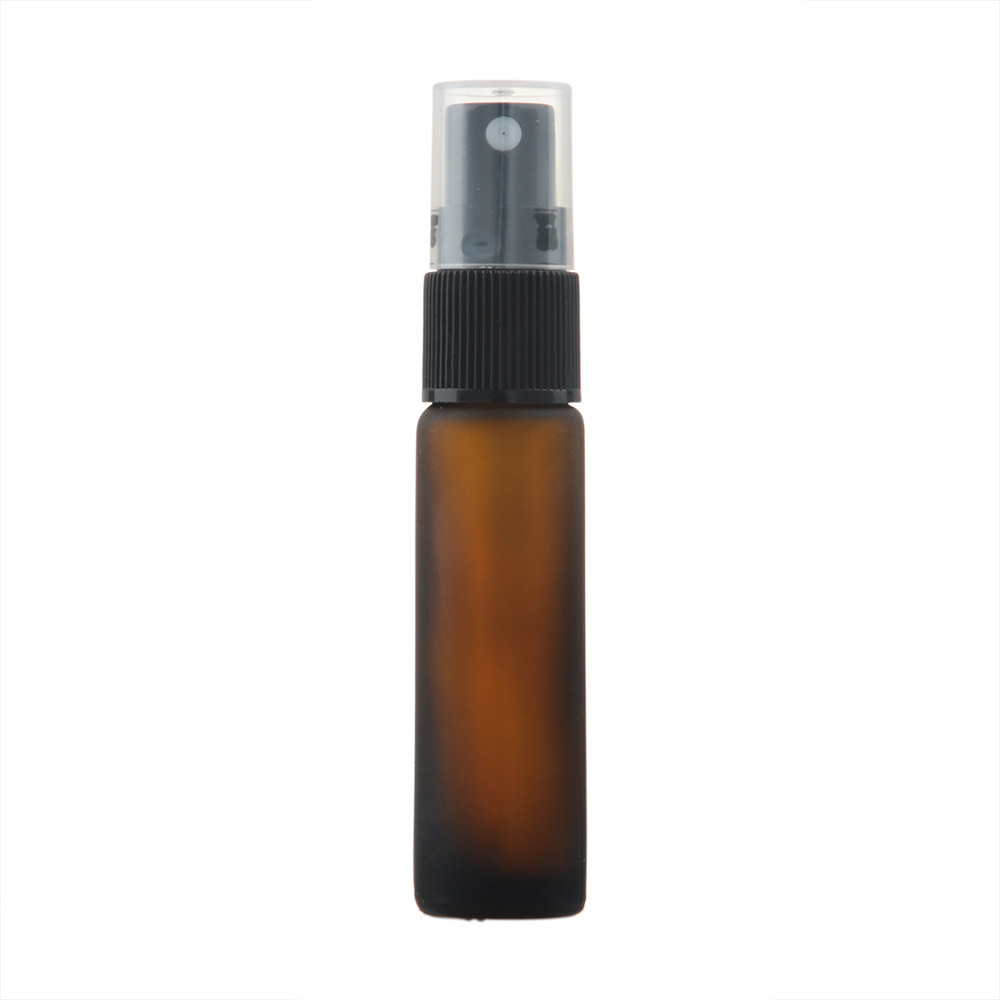 Tappo spray in plastica nera e ambra satinata