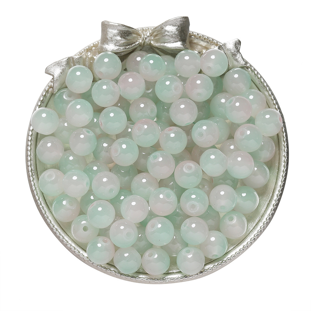 Perles imitation jade en verre bicolore - rose et vert