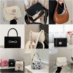 人気低価格バルク卸売90% クリーン新品ショルダーバッグレディースバッグファッションベールバッグストック衣類用