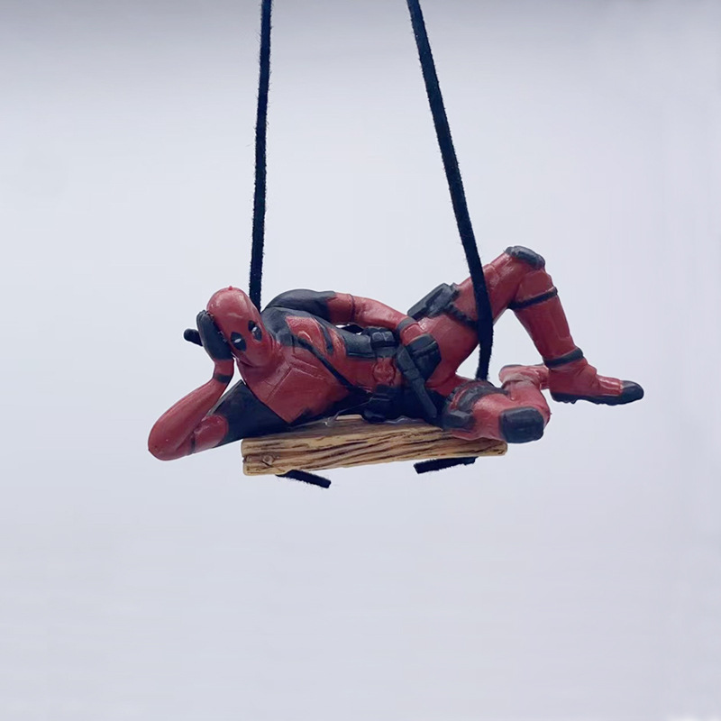 Posición de Deadpool acostado.