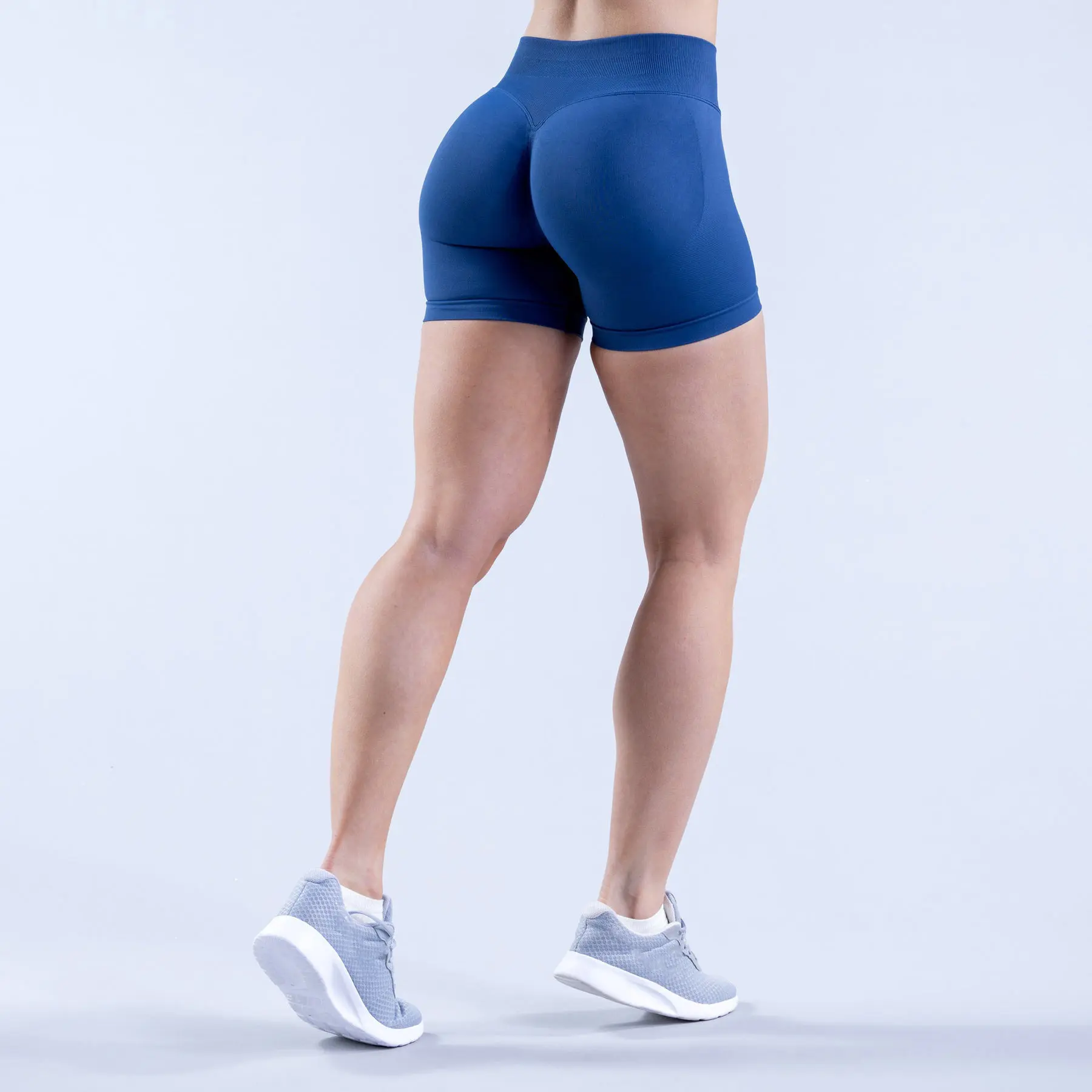 Produttori personalizzati donne all'ingrosso allenamento sudore vita bassa yoga nylon senza soluzione di continuità sport dfyne impatto pantaloncini fitness