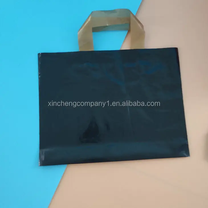 Bolsa de compras con nombre de marca personalizado, bolsa de plástico de promoción con asa de embalaje de ropa de boutique impresa con logotipo personalizado