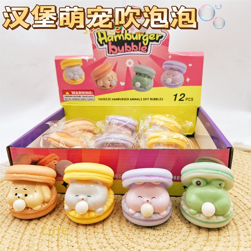 Macarrón, hamburguesa, burbuja sopladora.