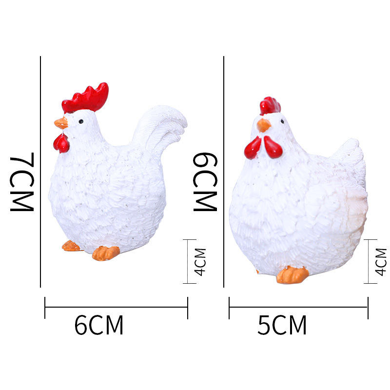 ไก่และไก่ตัวเมียสีขาวคู่หนึ่ง