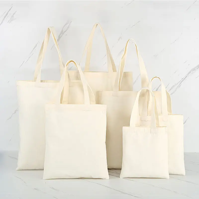 थोक कस्टम प्रिंट लोगो सस्ते पुन: प्रयोज्य शॉपिंग बैग सादे सफेद रिक्त कपास कैनवास बैग ले जाना