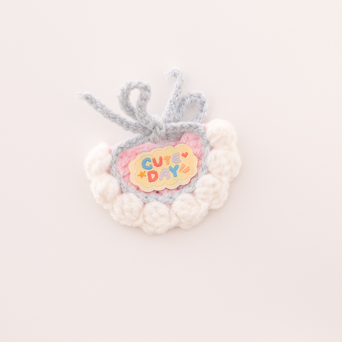 Bib with white background and yellow lettering