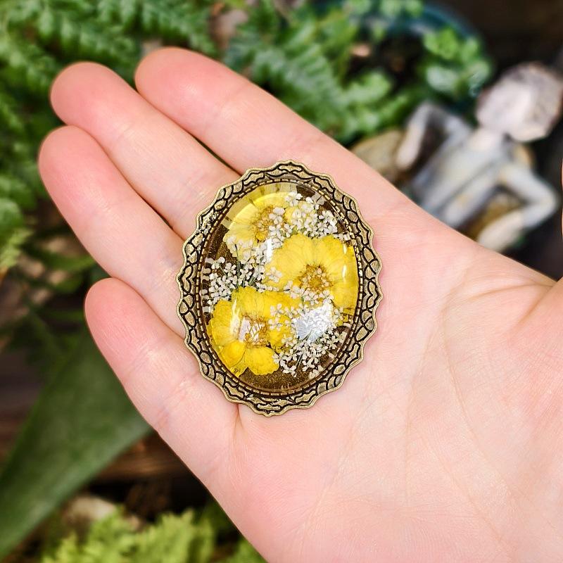 Yellow brooch