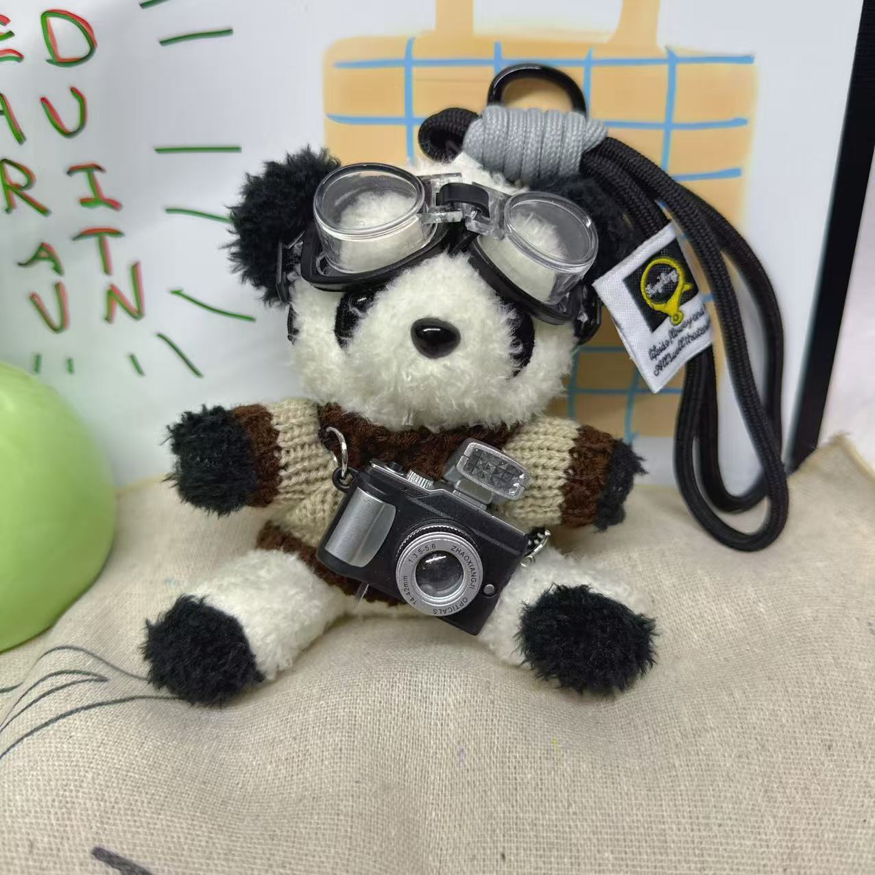 Camera panda khakis white stitching sweater