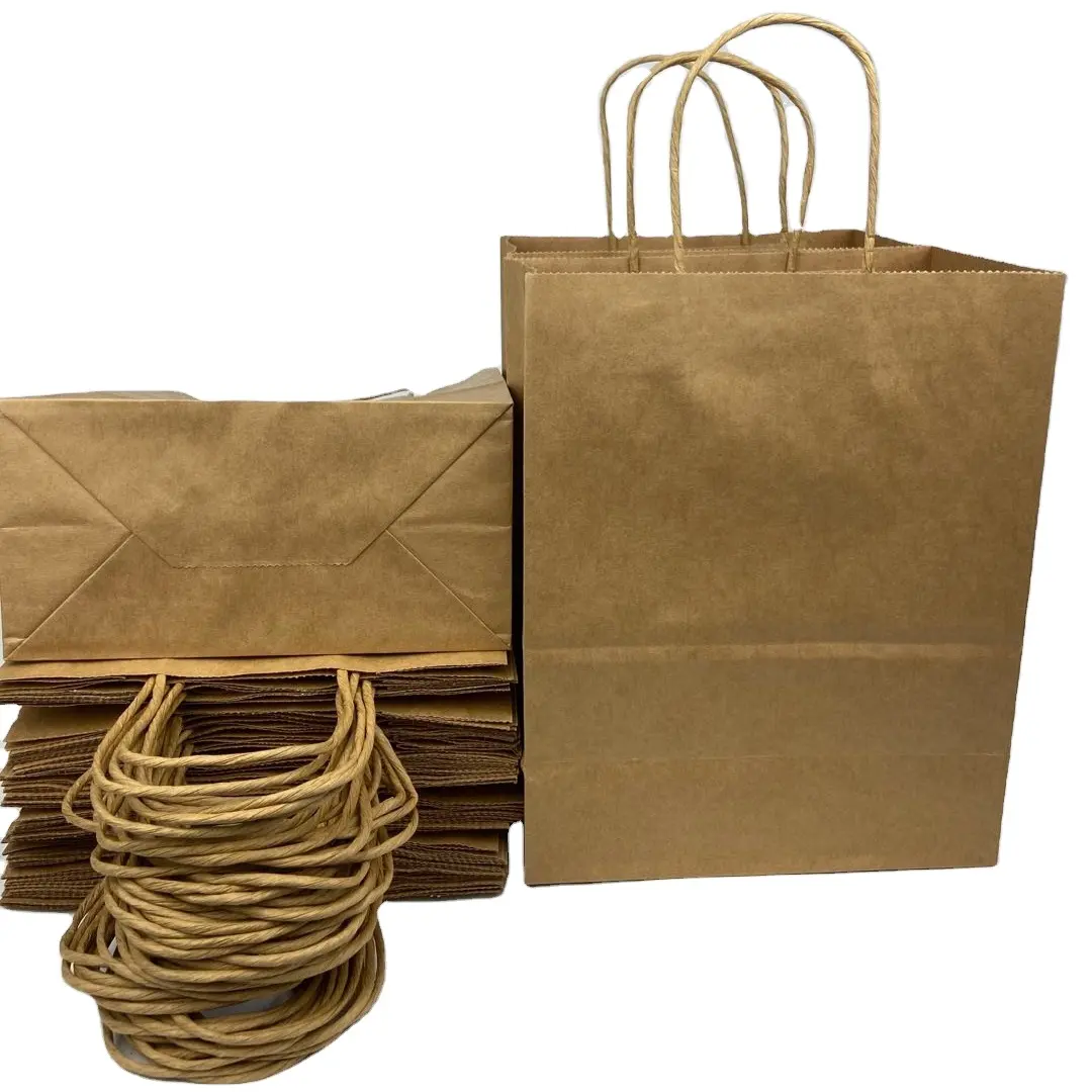 कस्टम पर्यावरण क्राफ्ट पेपर बैग लक्जरी रिबन संभाल बुटीक शॉपिंग बैग पैकेजिंग अनुकूलित मुद्रित यूरो ढोना कागज उपहार बैग
