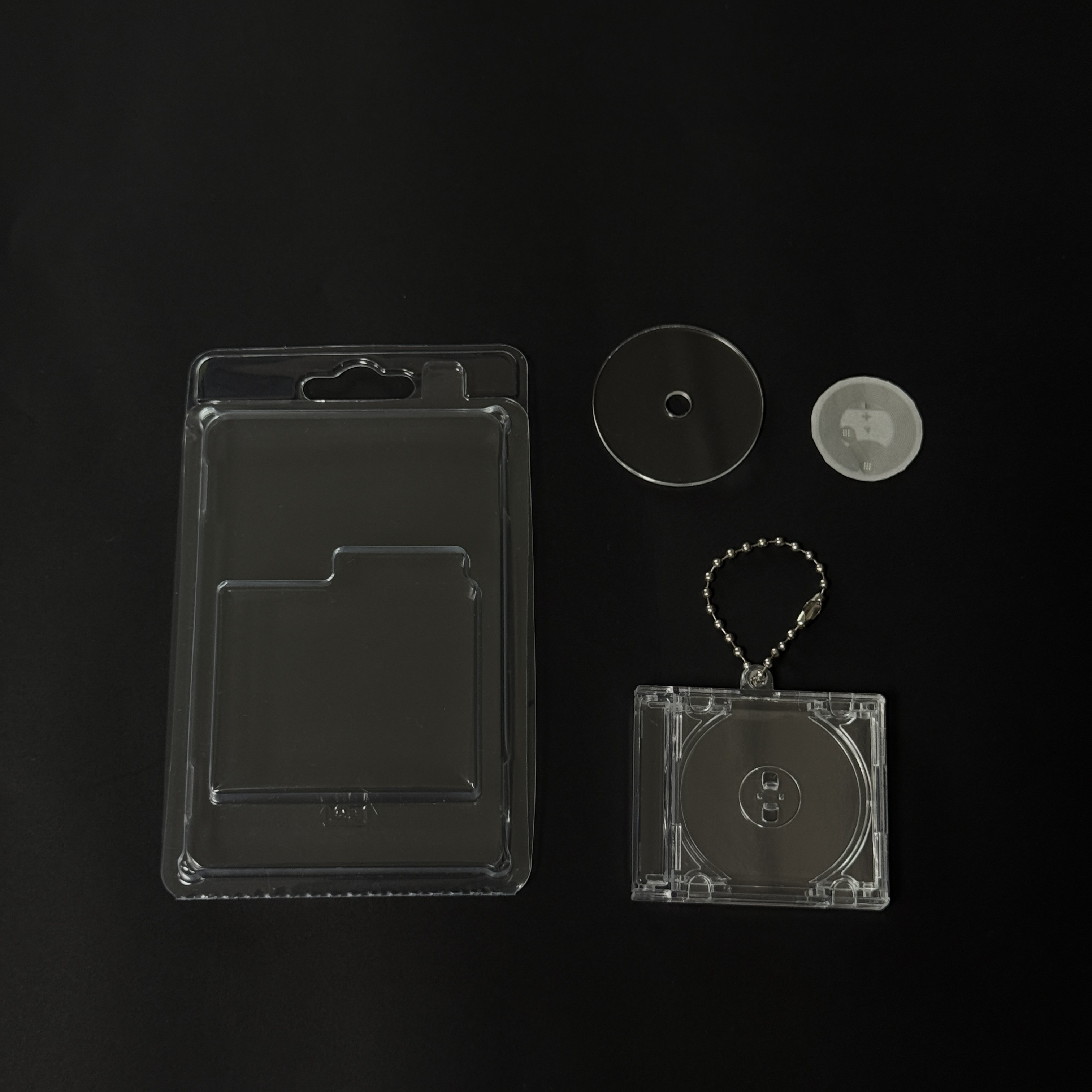 Custodia CD + Catena con Perline + Disco + NFC + Confezione Blister