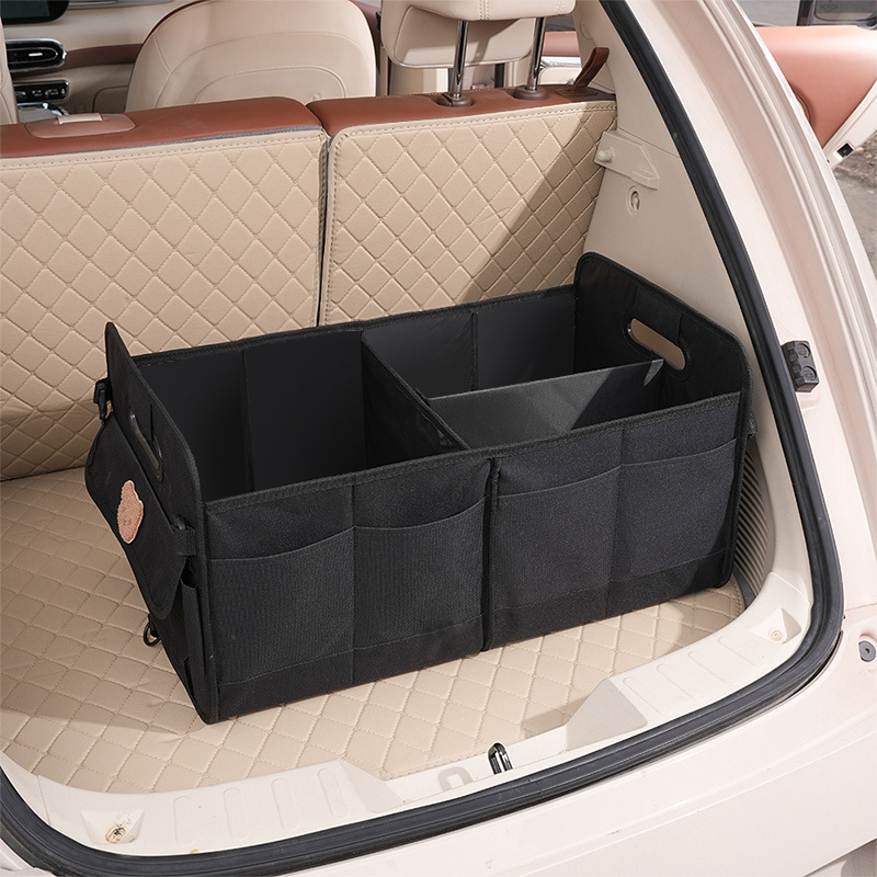 Sac de rangement noir pour coffre avec autocollant tête d'ours.