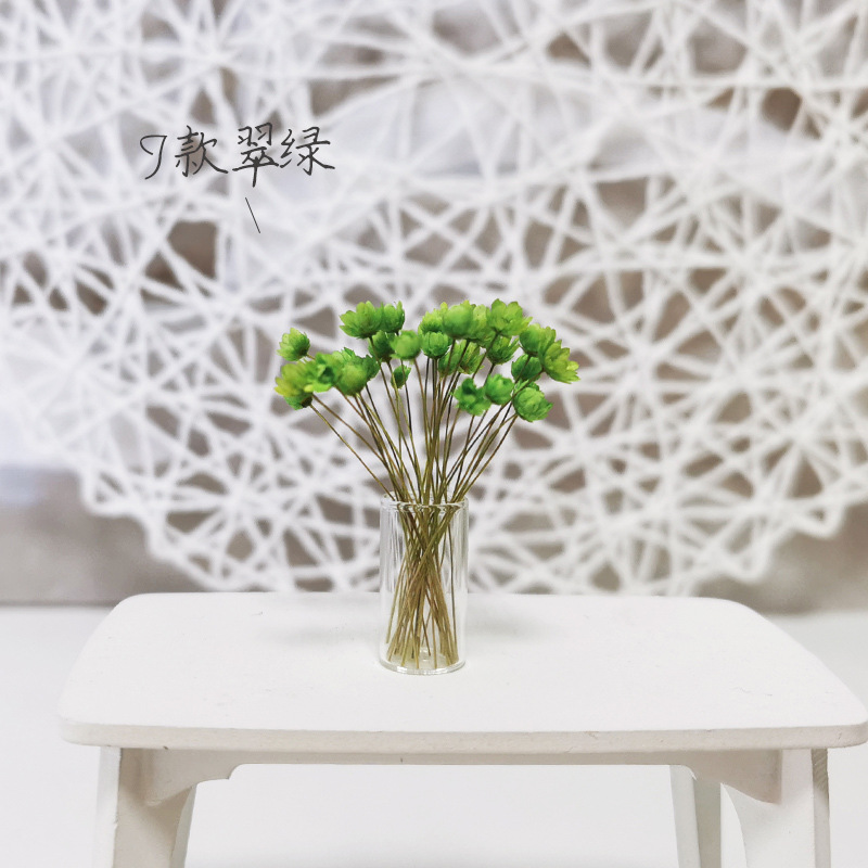 Flor estrella verde esmeralda tipo J + botella de vidrio