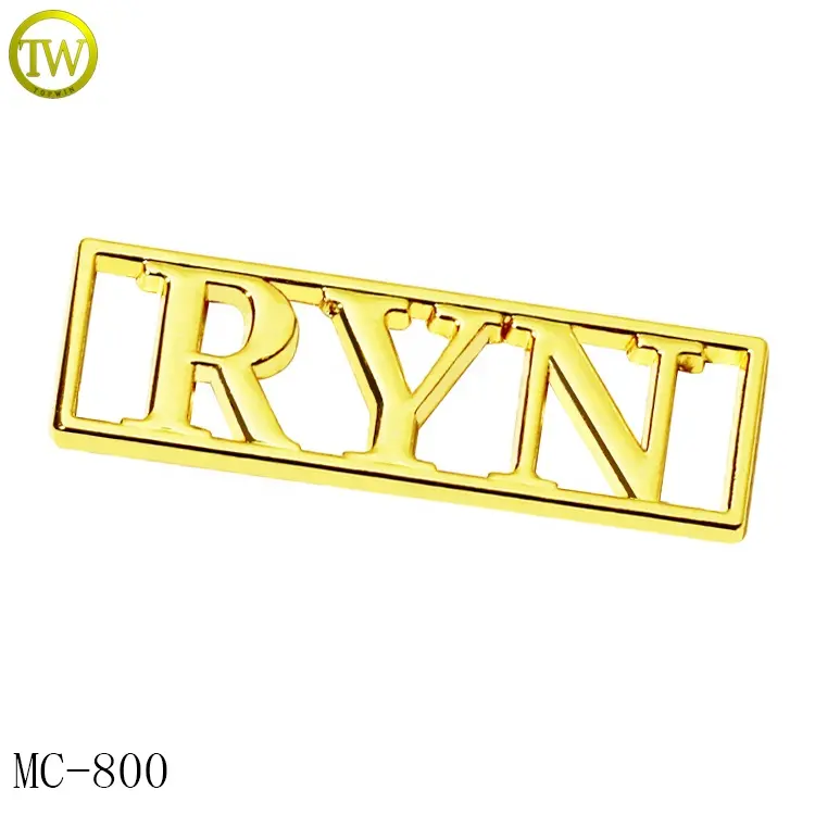 Letras huecas accesorios de ropa etiquetas de nombre de metal de aleación de zinc personalizadas etiquetas chapadas en oro con logotipos de la empresa