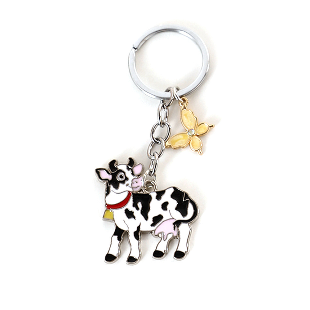 02 vache regardant un papillon