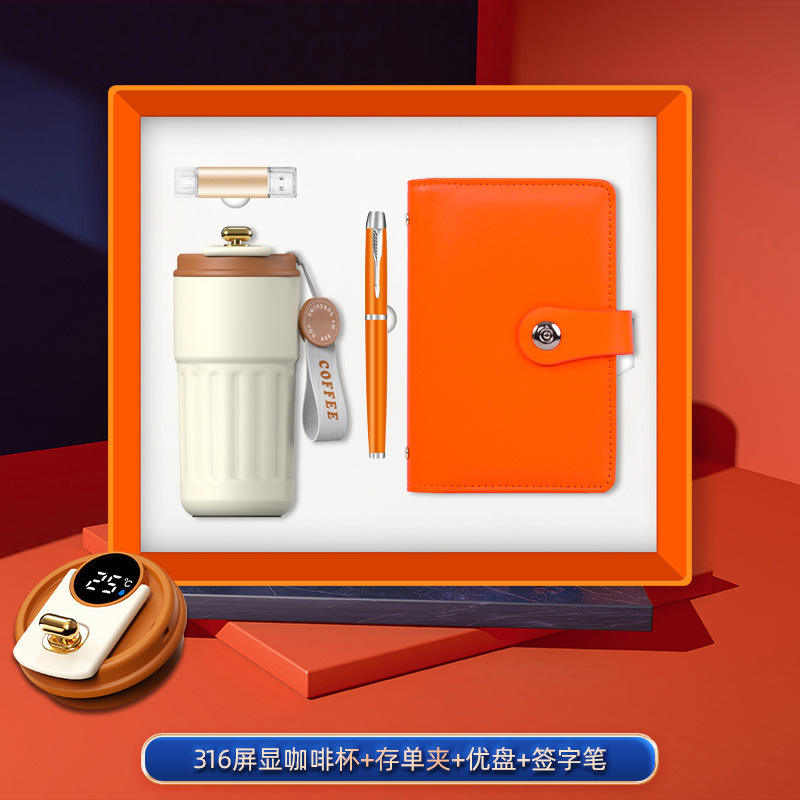 Ensemble quatre pièces orange : tasse à café, porte-dépôt, stylo, clé USB