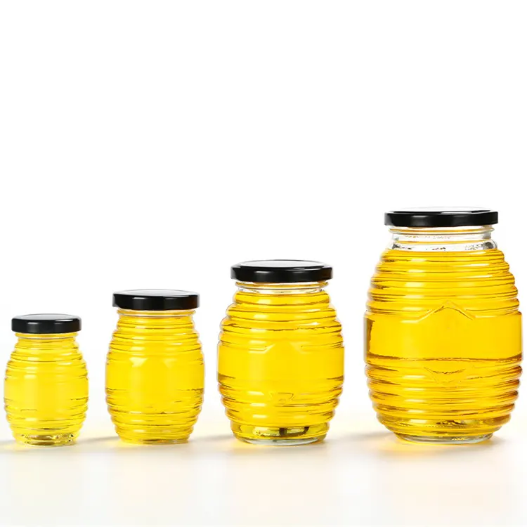China supplier wholesale 150g 250g 500g 1000g honeycomb shape glass honey jars