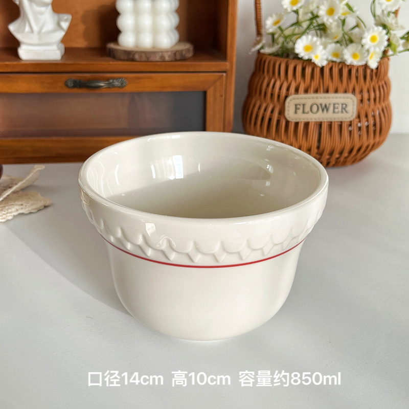 A 5.5-inch soup bowl with red line relief