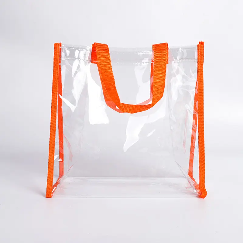 Bolso de compras transparente impermeable al por mayor con logotipo personalizado, bolso de mano de pvc transparente a la moda con asas