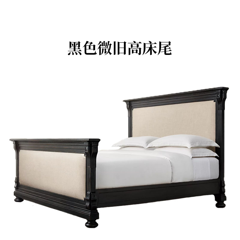 Pie de cama alto negro ligeramente desgastado