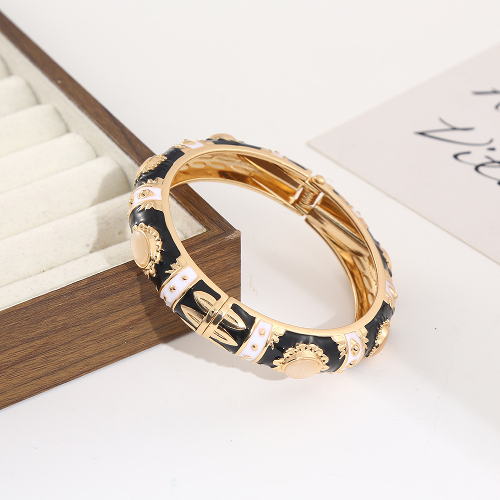 Gold-black-white