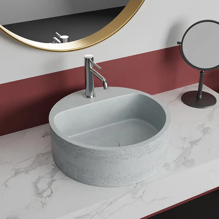 חדר אמבטיה דלוקס עגול בטון לשטוף את הכיור עם ברז חור אמבטיה