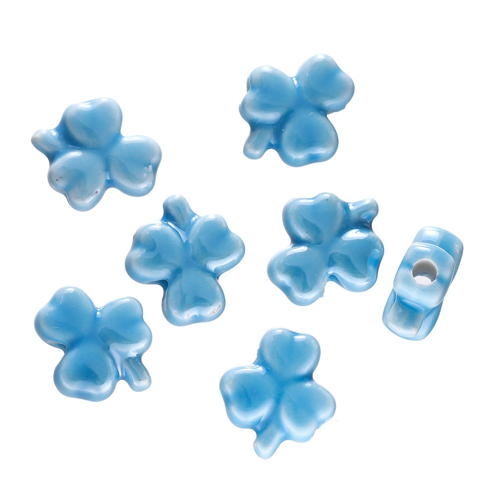 Perles trèfle en céramique - bleu