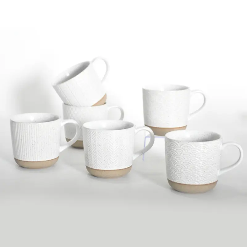 Taza ondulada en relieve blanca con esmalte de punta gruesa Taza de cerámica personalizada taza de café de degustación