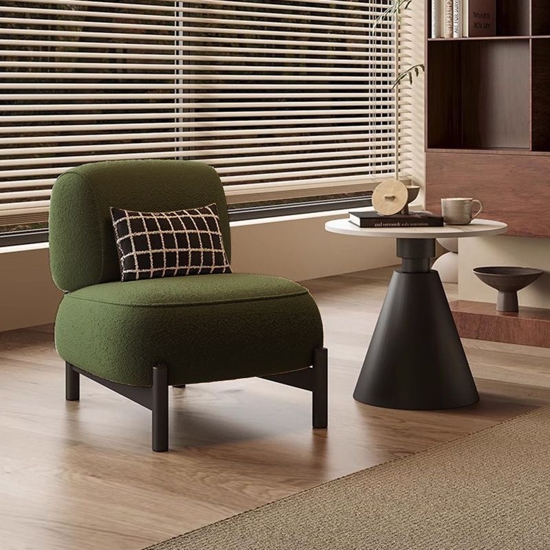 Fauteuil individuel en laine d'agneau vert forêt avec coussin.