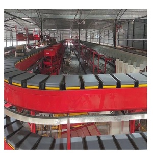 Selezionatrice di scarpe per lo smistamento di abbigliamento trasportatore di smistamento a nastro incrociato con DWS per lo smistamento dei pacchi nel mozzo di smistamento - Product Image 1
