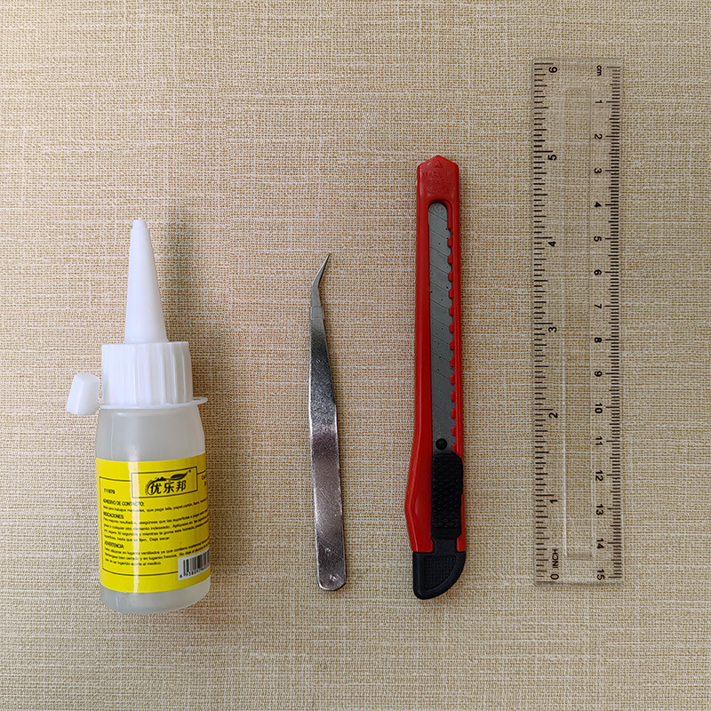 Arte cuchillo pinzas regla pegamento