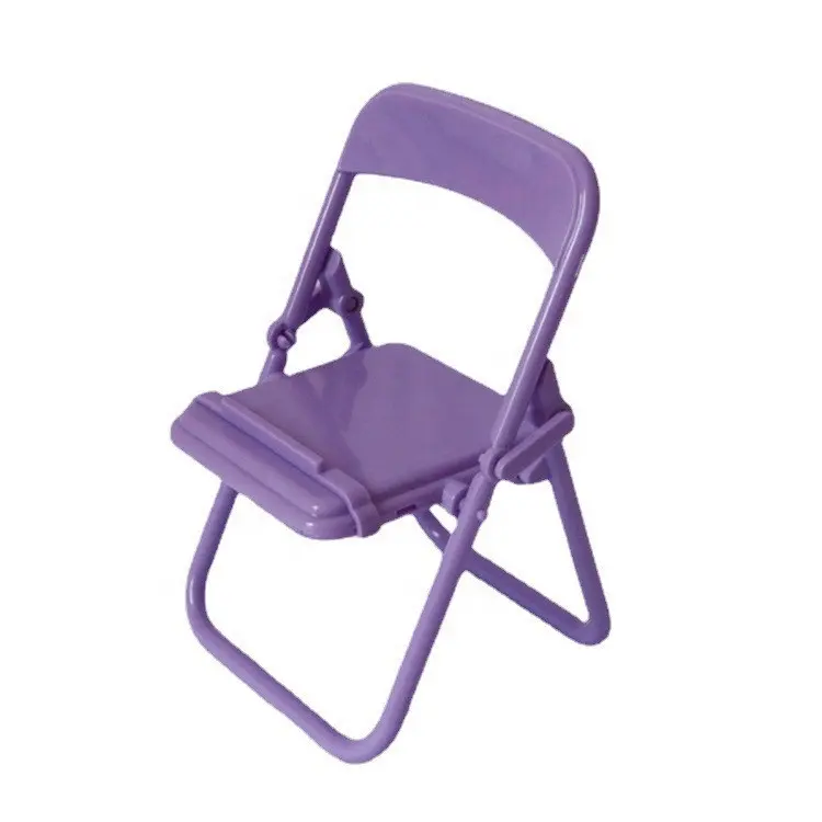 Petite chaise créative support de bureau pour téléphone portable, nouveau tabouret Macaron pliable support paresseux pour téléphone portable