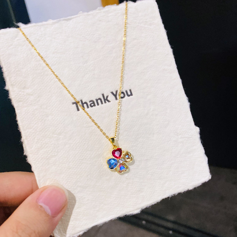 D07 golden glittering heart-shaped four-leaf clover
