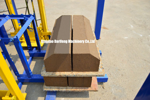 Máquina de fabricación de bloques de QT4-26, máquina de bloques de cemento para casas modulares de hormigón prefabricado - Product Image 5
