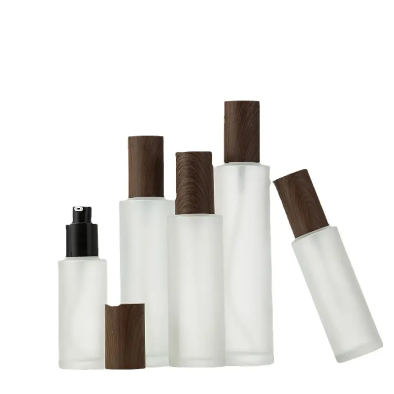 化粧品包装用竹蓋付き透明フラットショルダーガラス瓶卸売