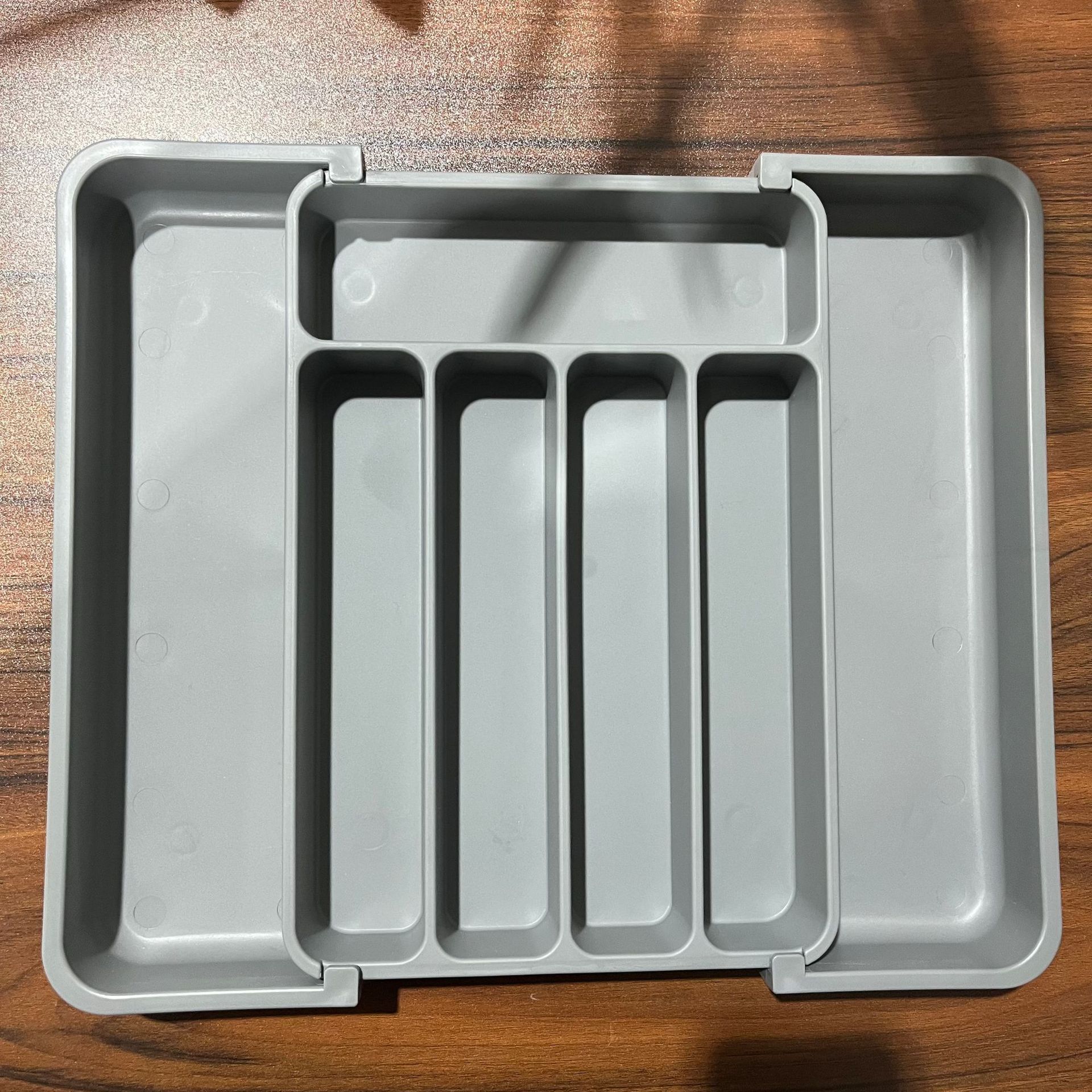 Small embossed color designation for black, white, and gray (single)