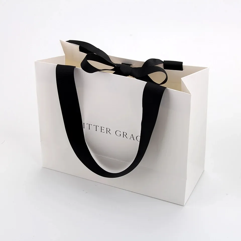 Bolsas de papel con impresión personalizada, bolsas de regalo de papel Kraft blanco de lujo con asa de cinta para bolsa de compras con su propio logotipo