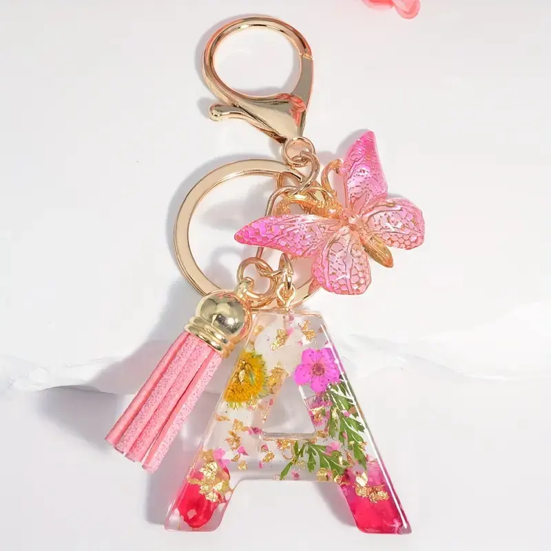 Papillon frange fleur séchée alphabet porte-clés personnalisé fleur résine initiale porte-clés au prix le plus compétitif