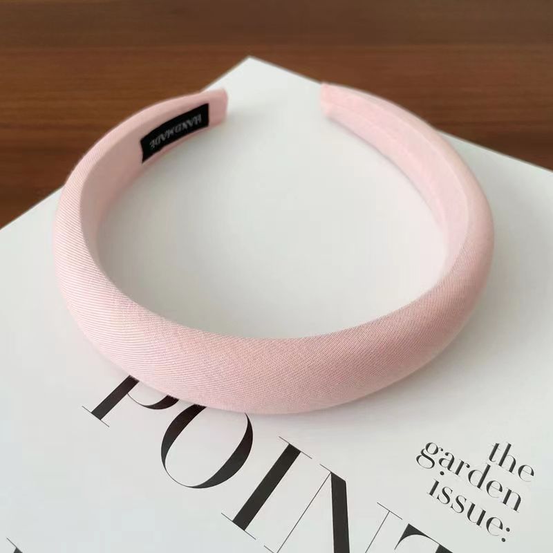 Diadema de esponja rosa claro